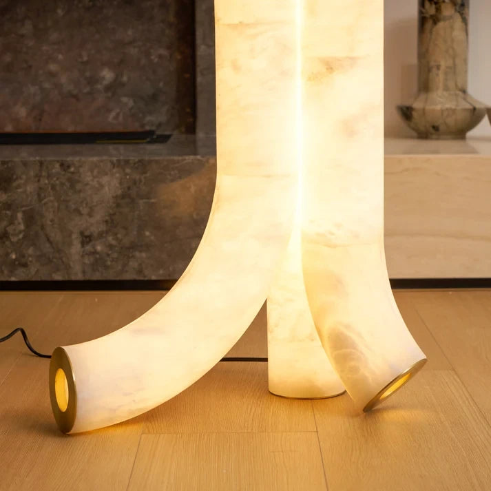 Detail View of Glowing Alabaster Base Standing on Floor