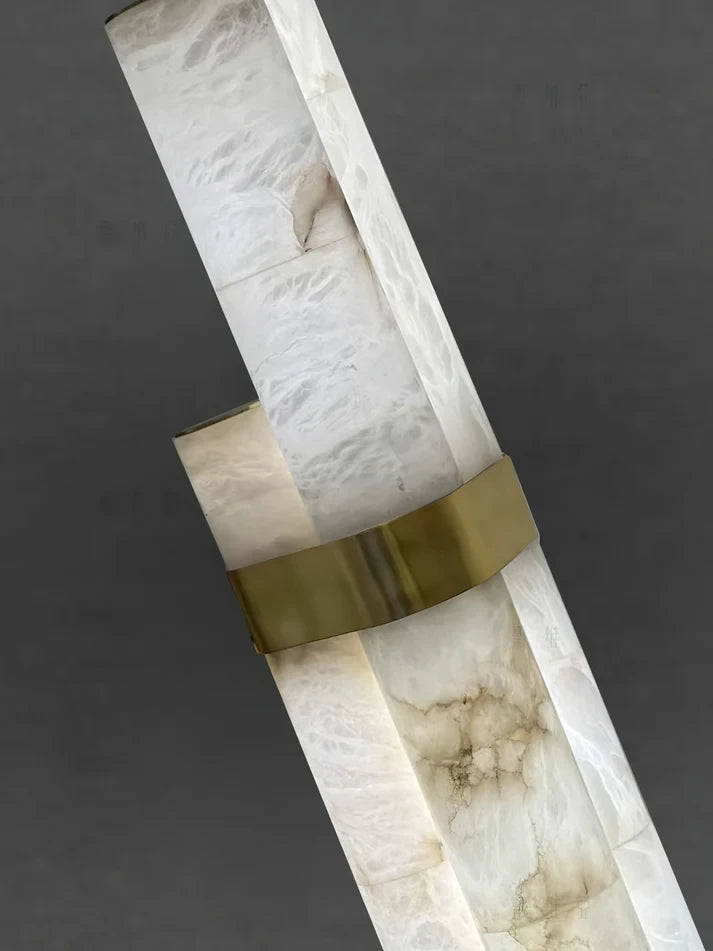 Close Up View of Brass Collar Clamping Alabaster Pillars
