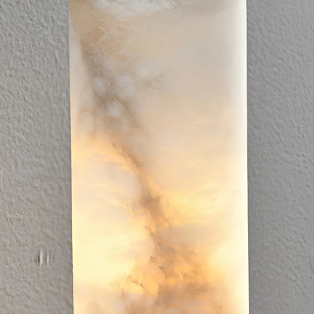 Close Up View of Illuminated Alabaster Tube Shade and Natural Stone Veins