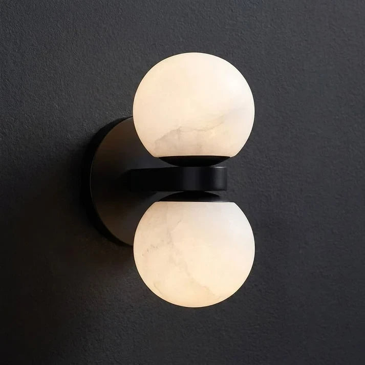 Illuminated Modern Black Finish Globe Wall Sconce Studio Shot