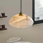 Close Up View of Alabaster Glass Shade and Brass Hardware