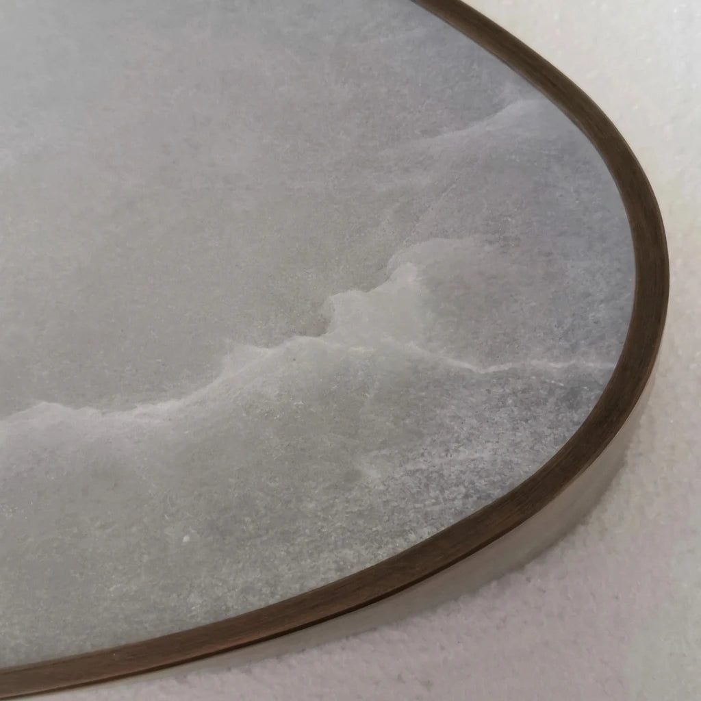 Close Up View of Oval Alabaster Stone Texture and Brass Rim