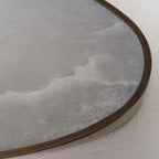 Close Up View of Oval Alabaster Stone Texture and Brass Rim