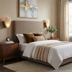 Modern Oval Alabaster Wall Sconce in Bedroom Setting