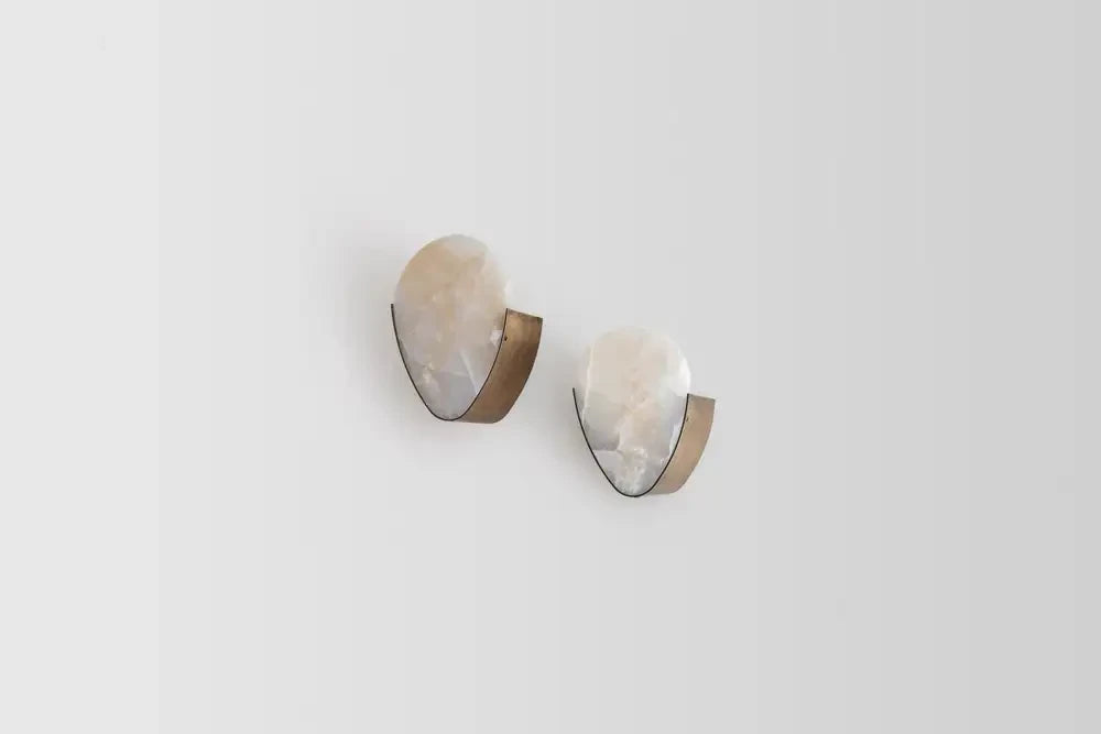 Illuminated Modern Alabaster Wall Sconces Studio Shot