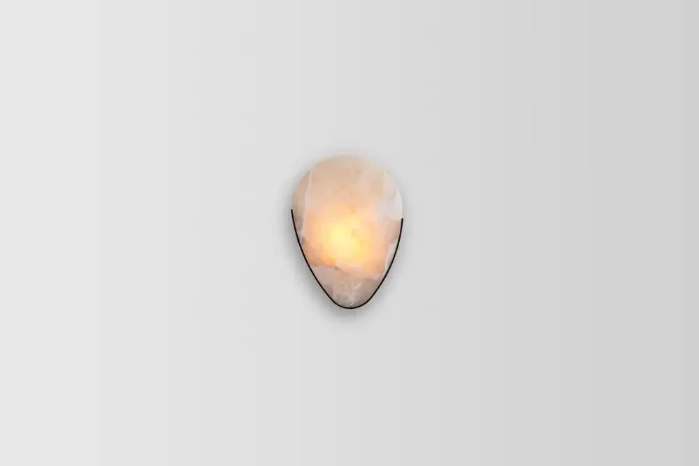 Side View of Illuminated Modern Oval Wall Sconce