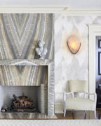 Modern Art Glass Wall Sconce Over Fireplace Setting