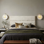Modern Round Alabaster Wall Sconces in Master Bedroom