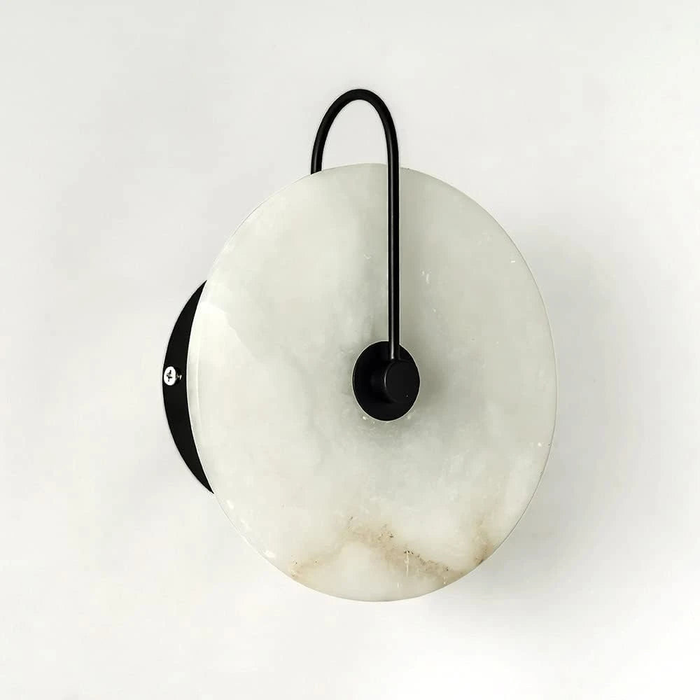Close Up View of Black Hardware and Round Alabaster Stone Edge