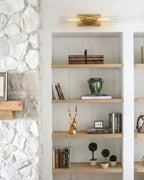 Modern Brass Wall Sconce in Study Room Setting