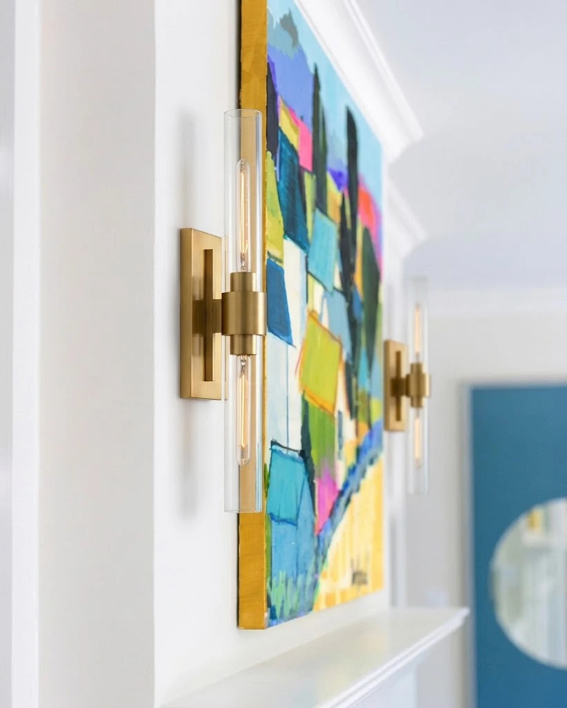 Modern Brass Wall Sconce Along Hallway Foyer