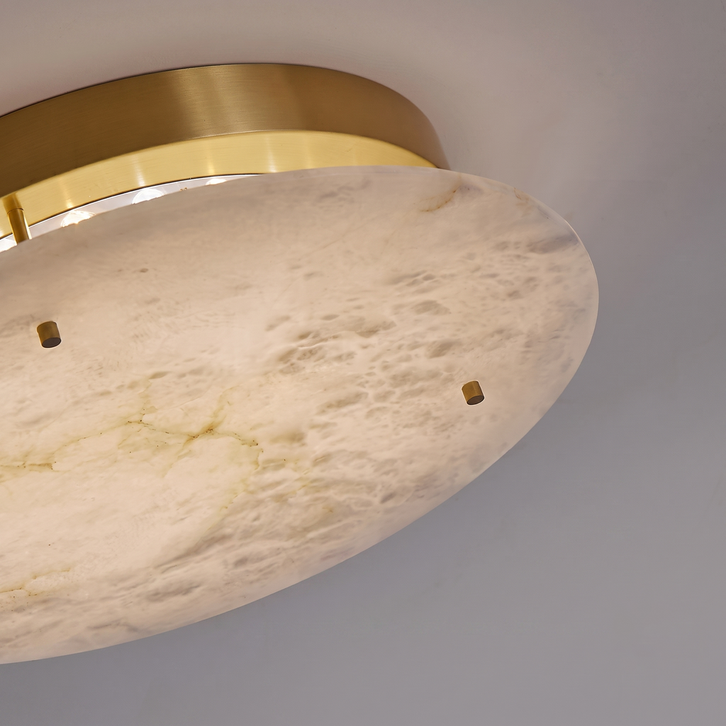 Bottom Angle View of Translucent Alabaster Disc and Brass Hardware