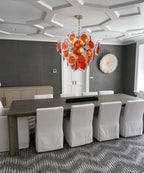 Modern Orange-Red Iridescent Round Disc Art Glass Chandelier in Luxury Dining Area