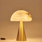 Illuminated Modern Brass Cone Base Alabaster Dome Table Lamp Studio Shot on Dark Background