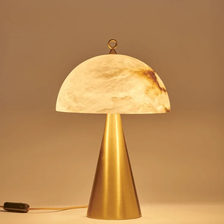 Illuminated Modern Brass Cone Base Alabaster Dome Table Lamp Studio Shot on Dark Background