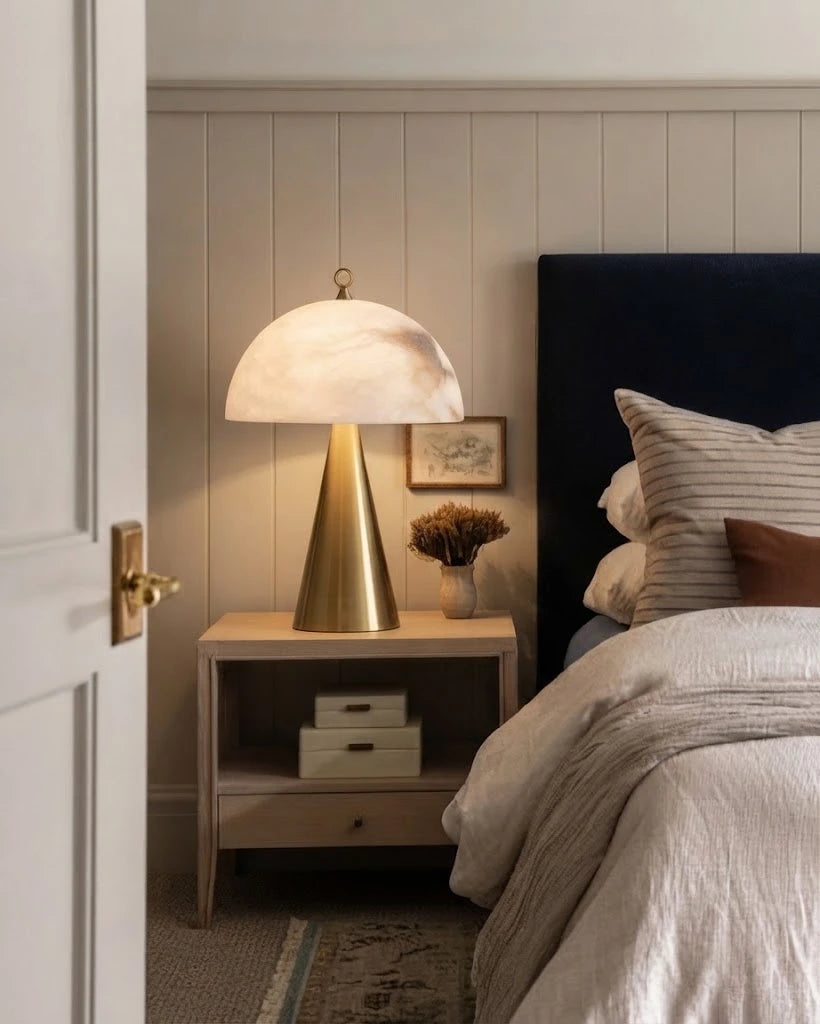 Modern Alabaster Dome Table Lamp in Cozy Bedroom Setting