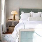 Modern Brass Alabaster Mushroom Table Lamp in Cozy Bedroom Interior