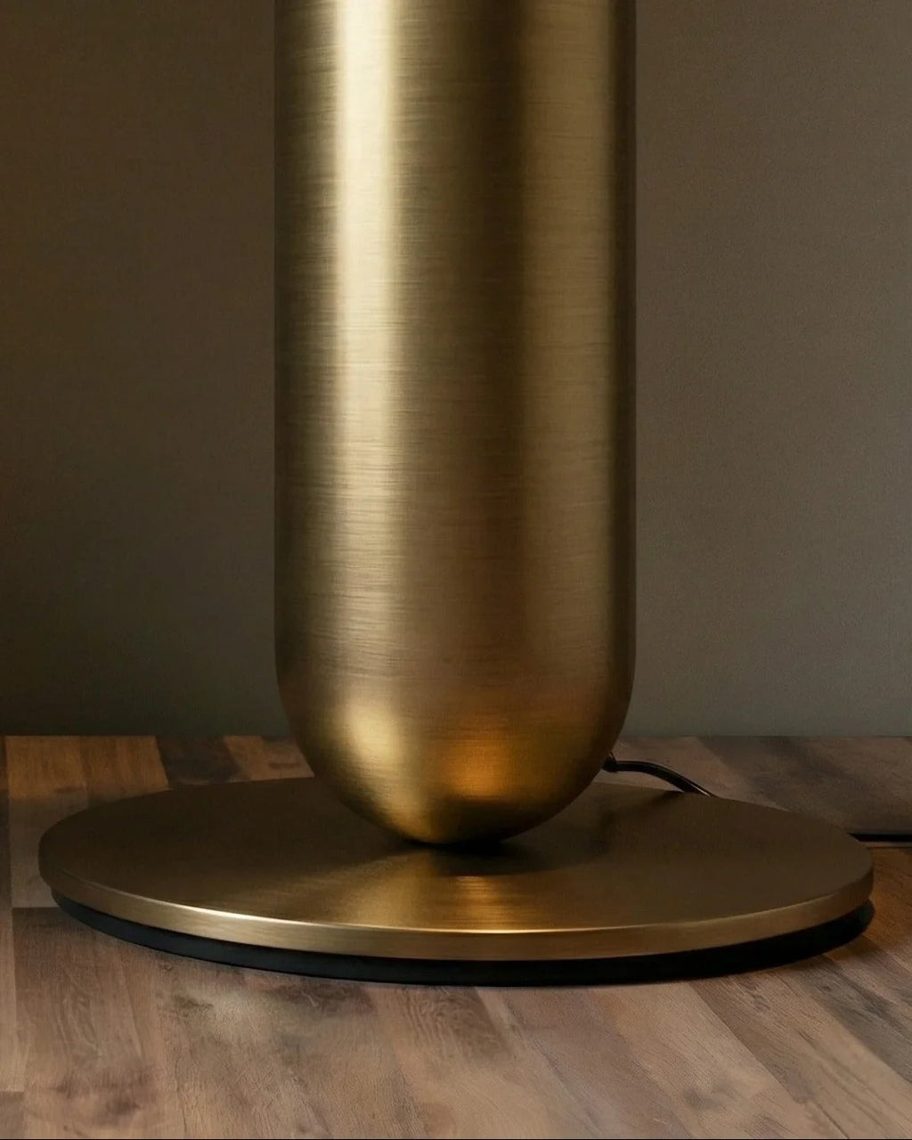 Close Up View of Modern Brass Base and Table Connection Details