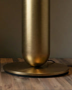 Close Up View of Modern Brass Base and Table Connection Details
