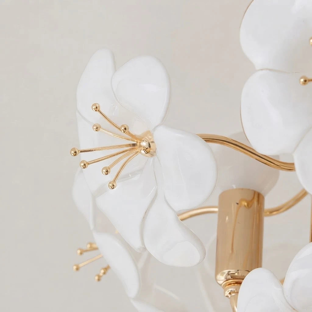 Close Up View of White Ceramic Petals and Brass Stamens