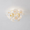 Illuminated Modern White Ceramic Petal Ceiling Light Studio Shot