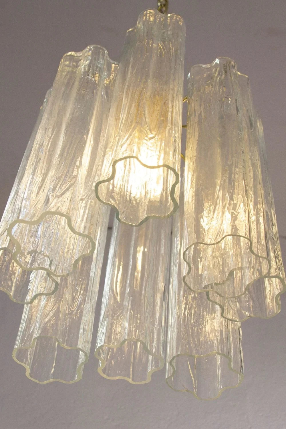 Illuminated Modern Fluted Art Glass Pendant Light Studio Display