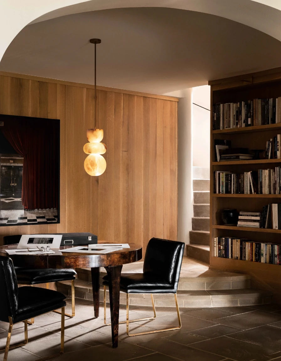Modern Alabaster Totem Pendant Lamp Over Wooden Dining Area