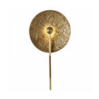 Modern Textured Disc and Vertical Rod Wall Sconce with Gold Finish and Warm Light on Pure White Background