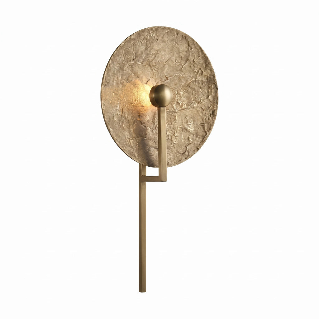 Illuminated Modern Textured Disc Wall Sconce Studio Shot on White Background
