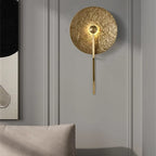 Modern Gold Finish Wall Sconce in Contemporary Interior Space