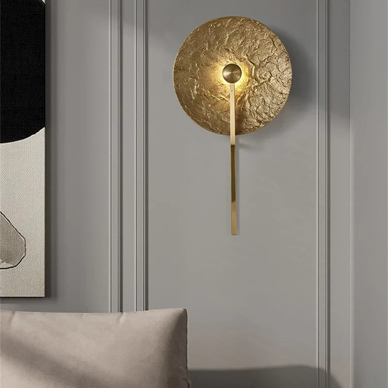Modern Gold Finish Wall Sconce in Contemporary Interior Space
