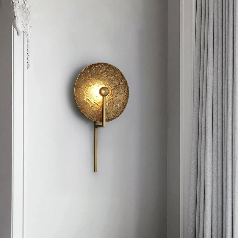 Modern Textured Disc Wall Sconce in Elegant Hallway Corridor
