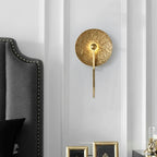 Modern Gold Finish Wall Sconce in Luxury Bedroom Interior