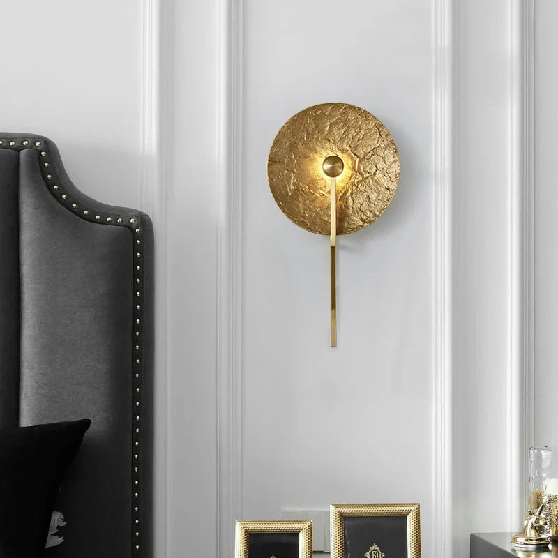 Modern Gold Finish Wall Sconce in Luxury Bedroom Interior