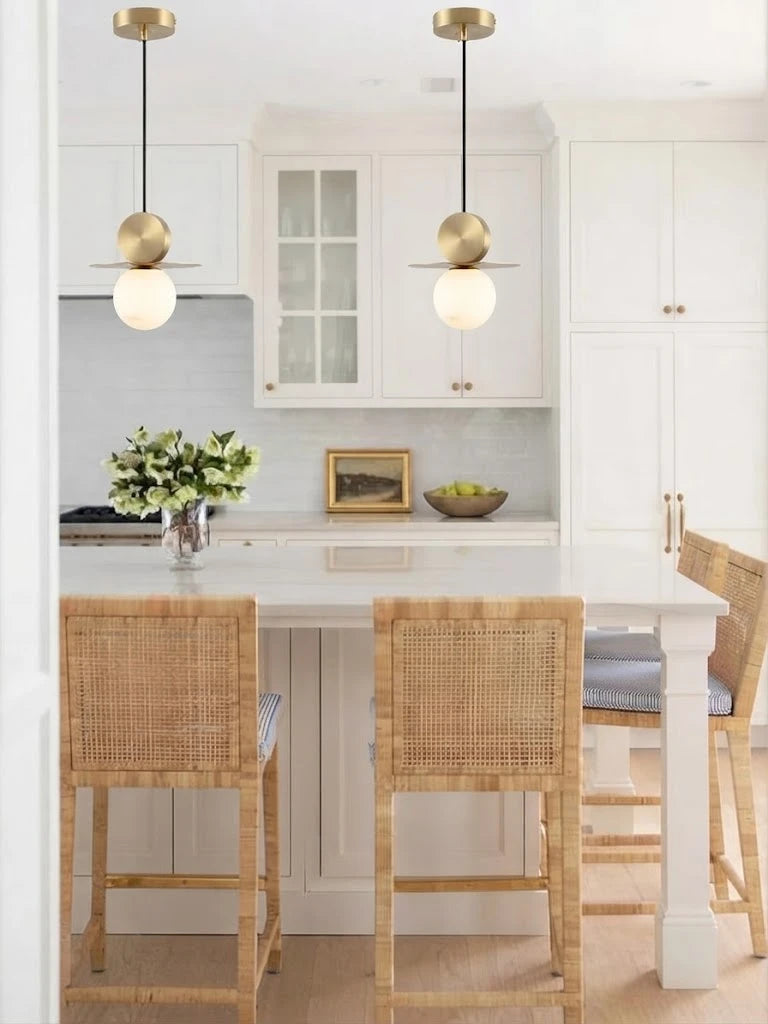 Modern Disc and Globe Pendant Light Over Kitchen Dining Area