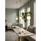 Modern Disc and Globe Pendant Lights in Dining Nook Setting