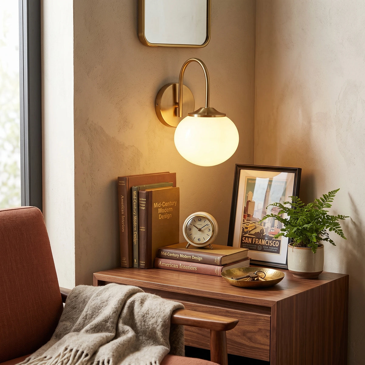 Brass Gooseneck Globe Light Illuminating Cozy Reading Nook