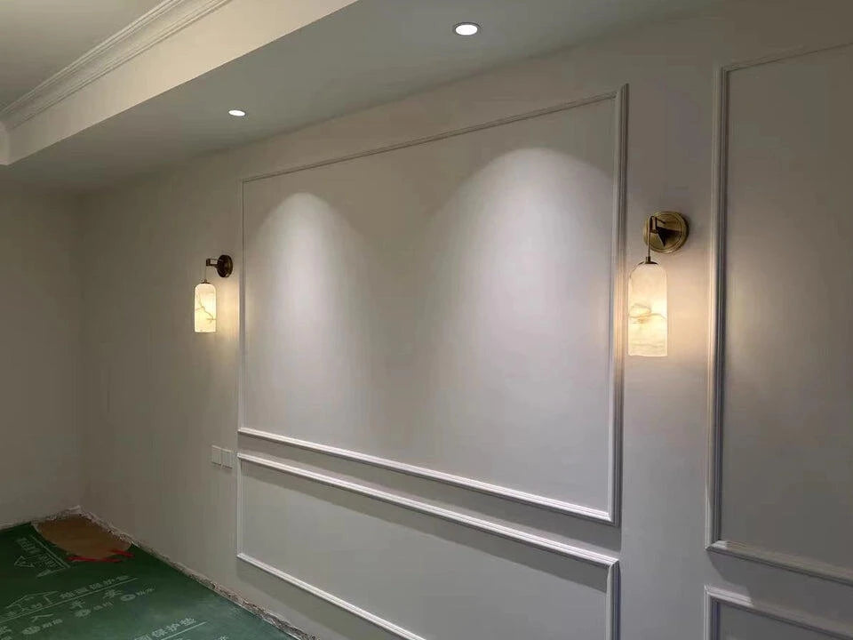 Pair of Alabaster Wall Sconces Installed on Molded Wall