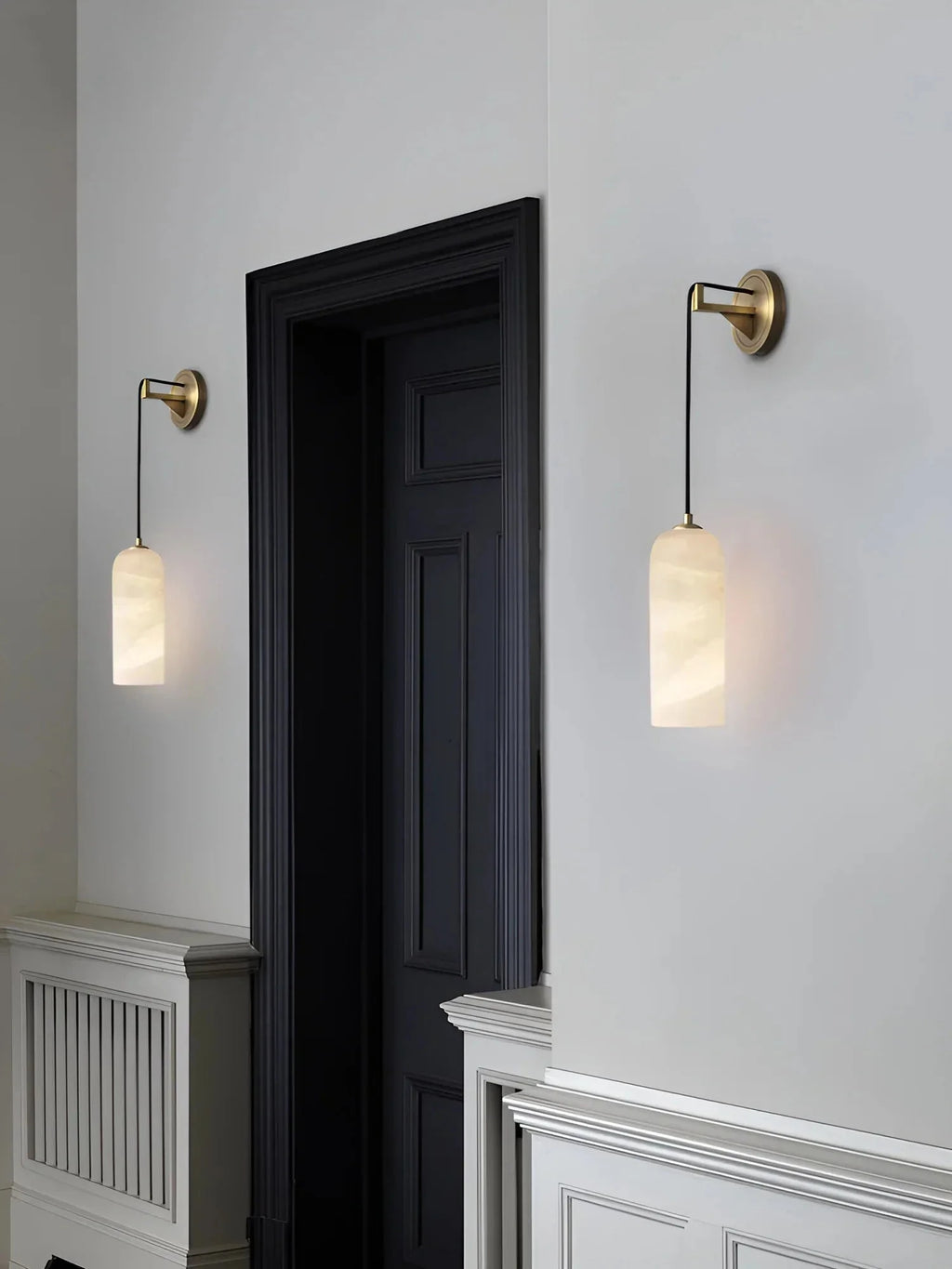 Pair of Alabaster Pendant Sconces Flanking Doorway