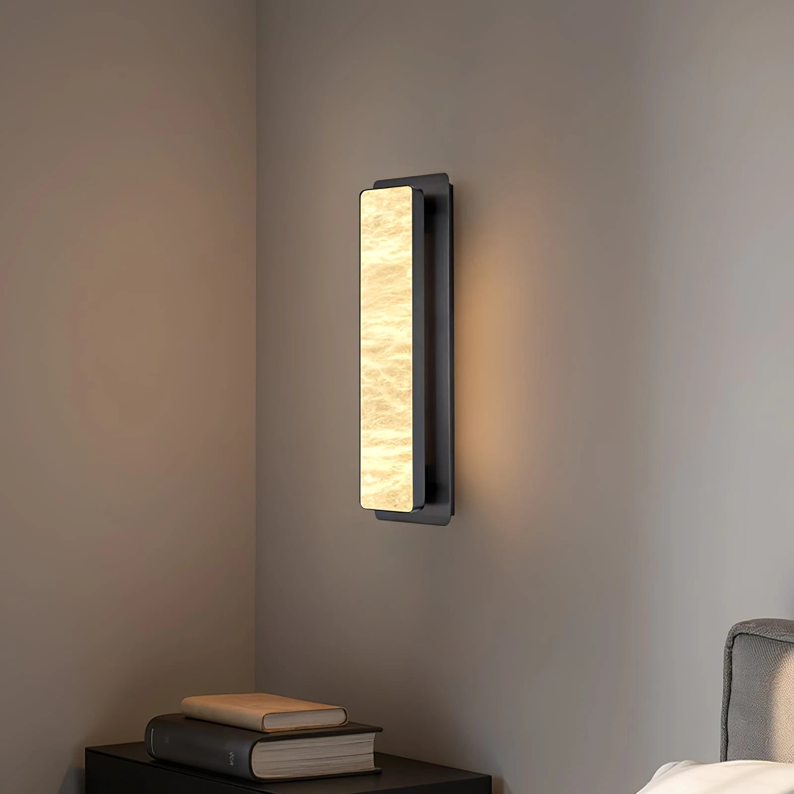 Modern Black Frame Alabaster Sconce Illuminating Interior Corner