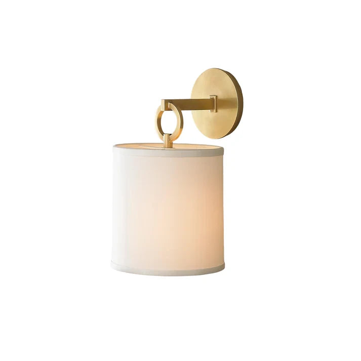Modern Brass Wall Sconce with Fabric Shade and Ring Accent on White Background