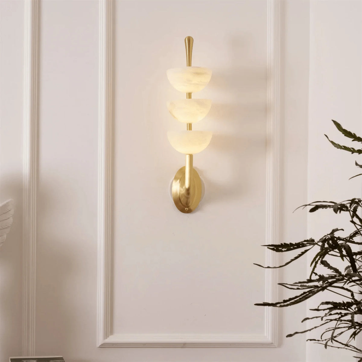 Tiered Alabaster Wall Light Mounted on Molded Wall Panel