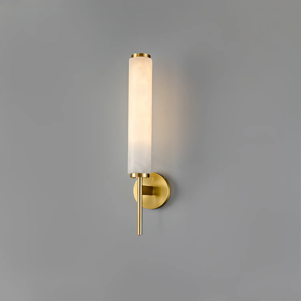 Brindisi single alabaster wall sconce polished brass hardware simple studio grey backdrop