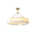 Angled View of Illuminated Modern Natural Shell Ring Chandelier
