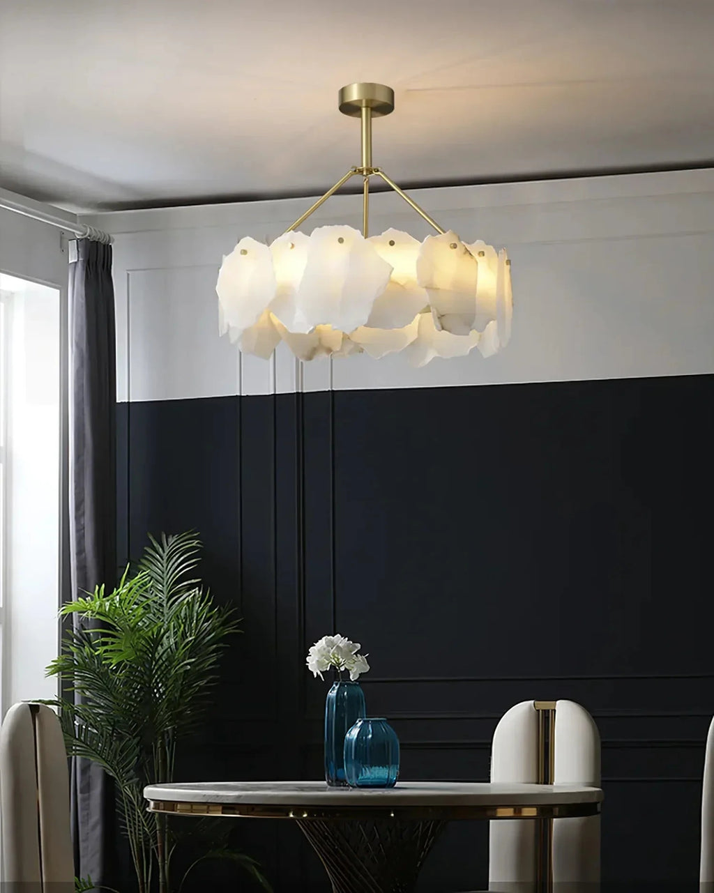 Modern Natural Shell Chandelier Over Round Dining Table
