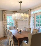 Modern Natural Shell Art Glass Chandelier Over Dining Room Table