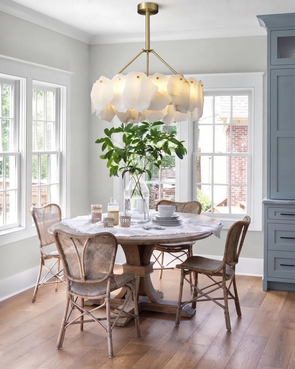 Modern Natural Shell Ring Chandelier Over Round Dining Table