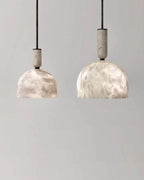 Illuminated Modern Brass Marble Dome Pendant Lights Studio Shot on Pure White Background