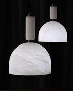 Illuminated Modern Brass Natural Marble Dome Pendant Lights Studio Shot on Dark Background