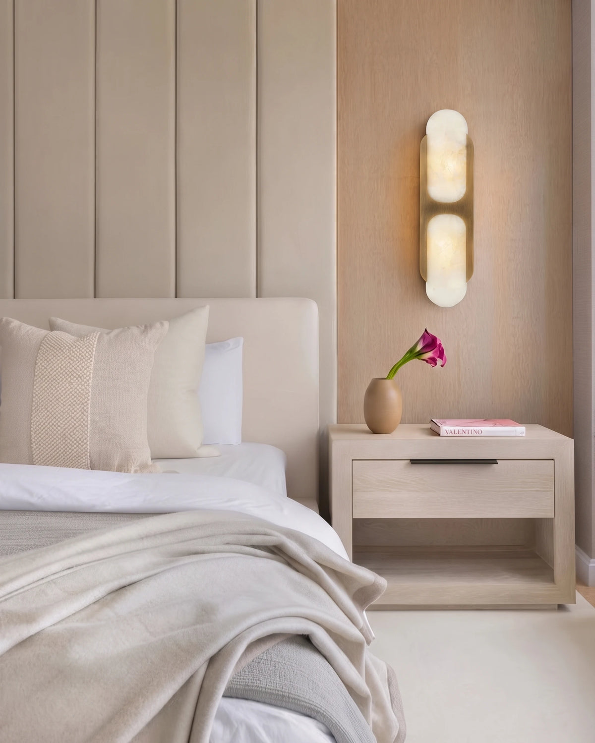 Modern Travertine Wall Sconce Over Nightstand in Bedroom